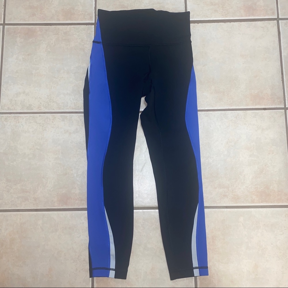 Lululemon Black leggings with Blue and White side stripe size 6